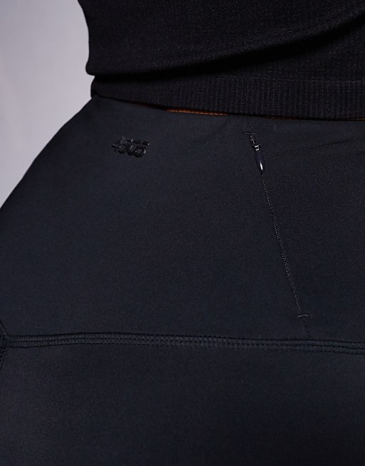 4505 Hourglass Icon Active High Waist 5 Inch Legging Short With Zip Phone Pocket In Black