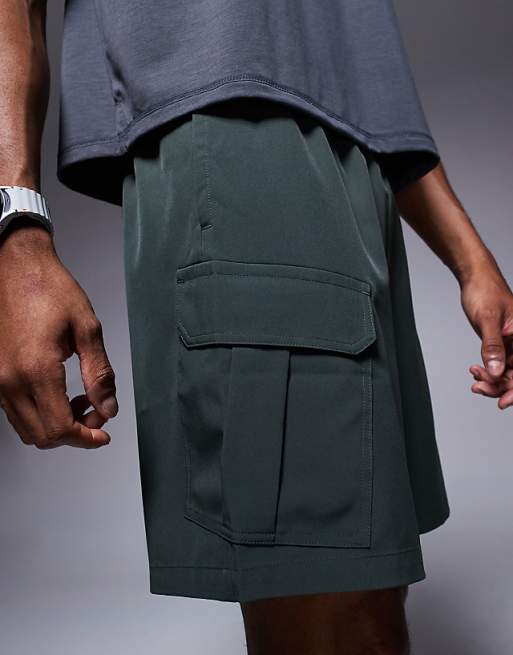 4505 Icon 7 Inch Quick Dry Training Cargo Shorts With Zip Pockets In Deep Khaki