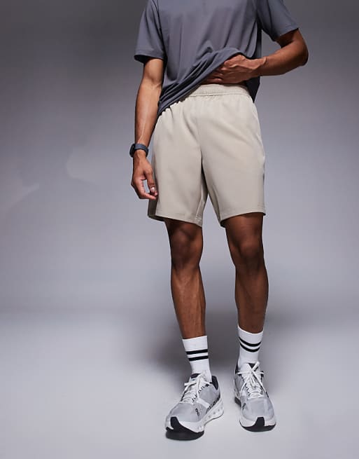 4505 Icon 7 inch quick dry training shorts with zip pockets in stone