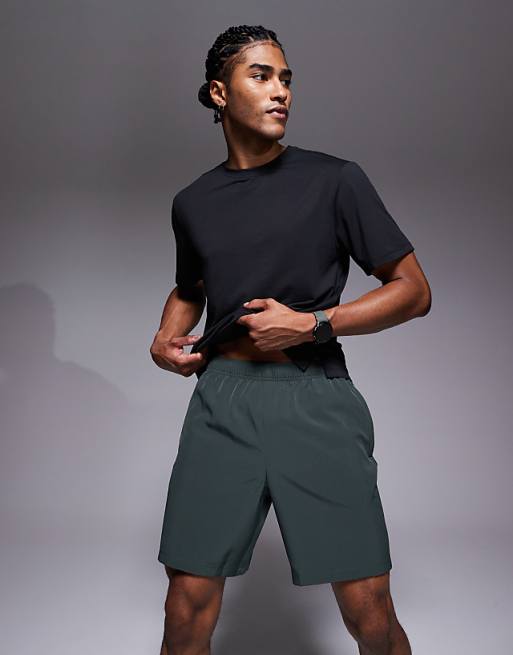 4505 Icon 7 Inch Quick Dry Training Shorts With Zip Pockets In Deep Khaki