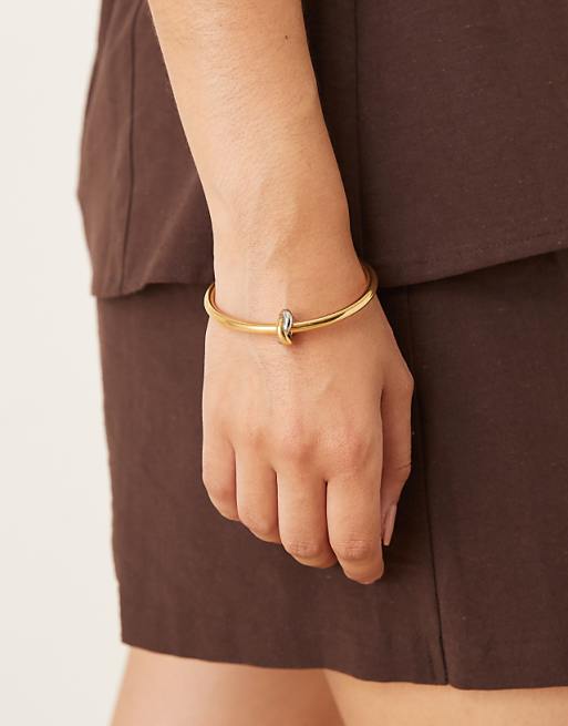 Abbott Lyon knot bangle bracelet in gold and silver plated