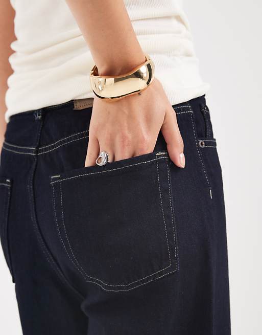 Accessorize chunky sculptual bangle in gold