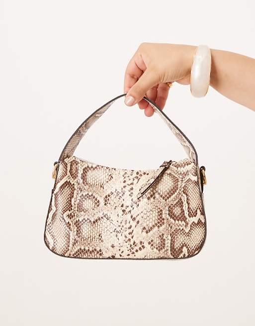 Accessorize Curved Handheld Snake Bag In Beige