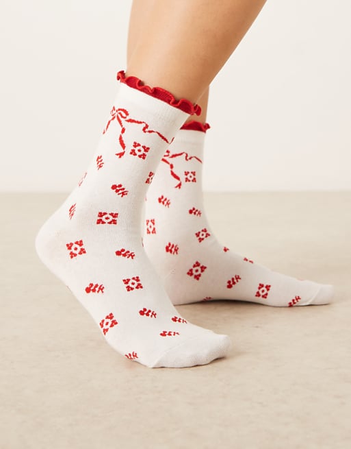 Accessorize red bow socks in white