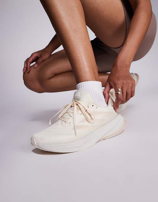 adidas Running Supernova Rise 2 trainers in white and beige