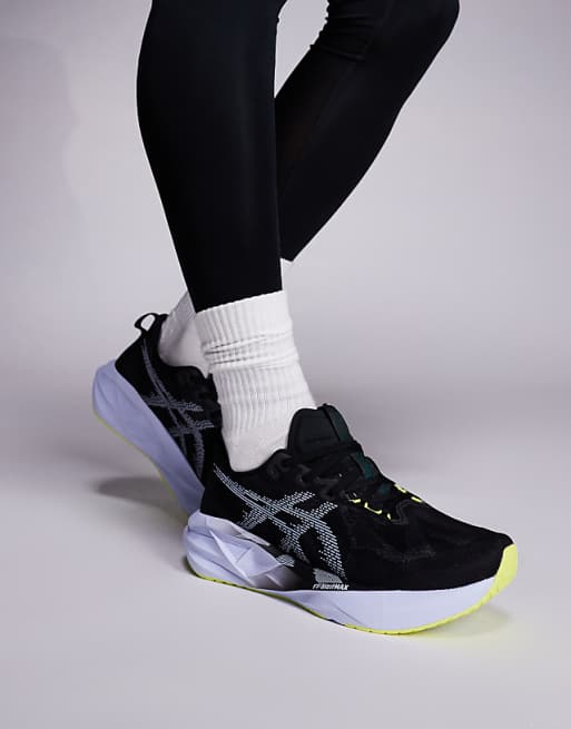 Asics Novablast 5 running trainers in black and blue fade