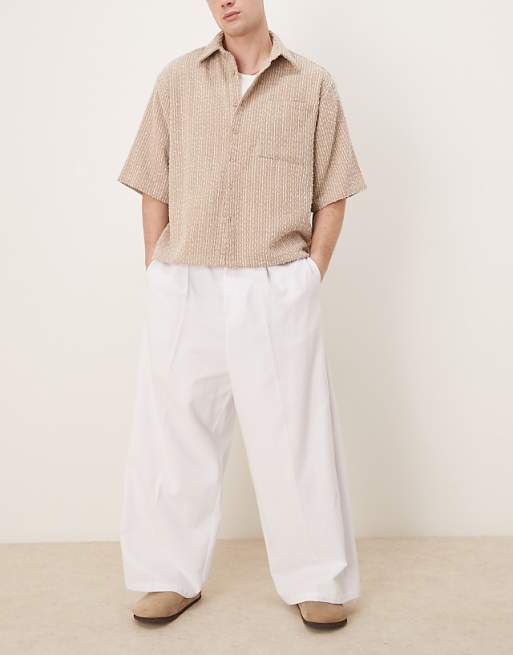 DESIGN baggy balloon trousers with pleats in white