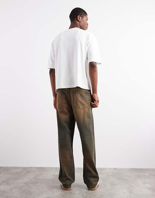 DESIGN Baggy Fit Jeans In Mid Wash Blue With Brown Tint