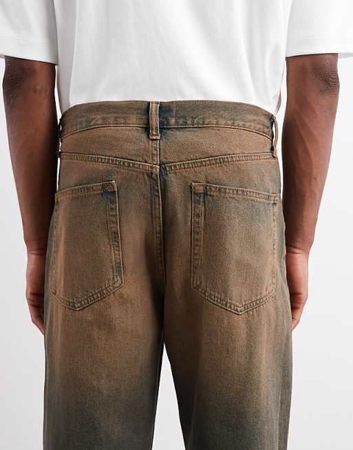 DESIGN Baggy Fit Jeans In Mid Wash Blue With Brown Tint