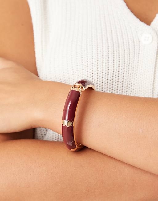 DESIGN bangle with burgundy enamel in gold tone