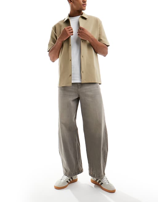 DESIGN barrel fit jeans with tint in brown