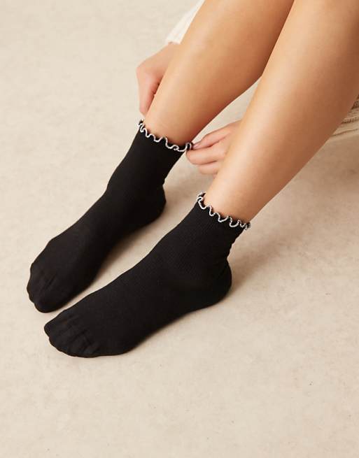 DESIGN black socks with silver glitter frill