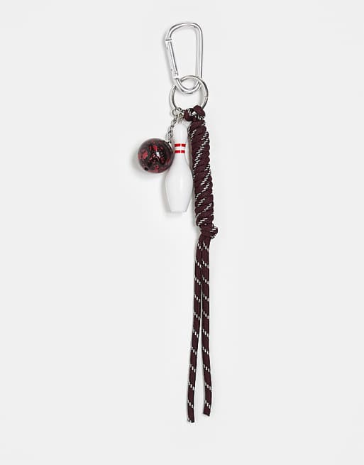 DESIGN bowling ball and pin bag cham in multi