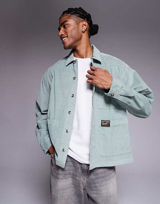 DESIGN boxy oversized cord shirt with badge detail in green