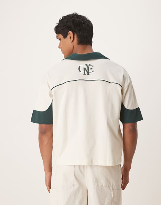 DESIGN Boxy Oversized Polo With Cut And Sew Panelling And City Graphics In Cream