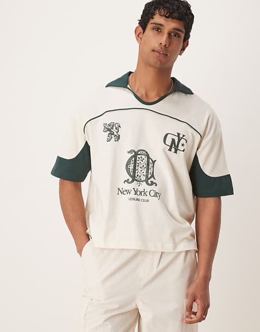 DESIGN boxy oversized polo with cut and sew panelling and city graphics in cream