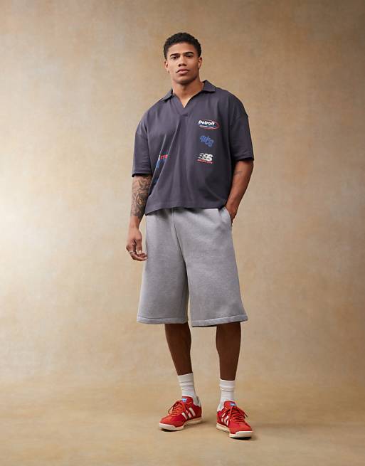 DESIGN Boxy Oversized Polo With Dropped Shoulder And Multiplacement Sport Print In Navy