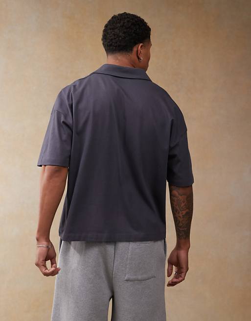 DESIGN Boxy Oversized Polo With Dropped Shoulder And Multiplacement Sport Print In Navy