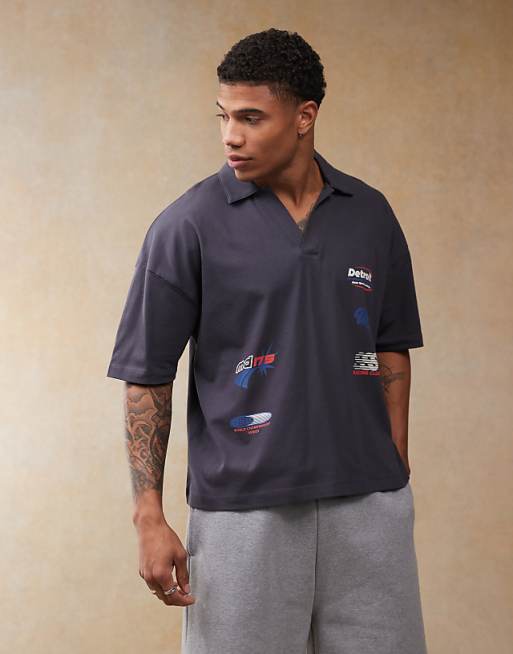 DESIGN boxy oversized polo with dropped shoulder and multiplacement sport print in navy