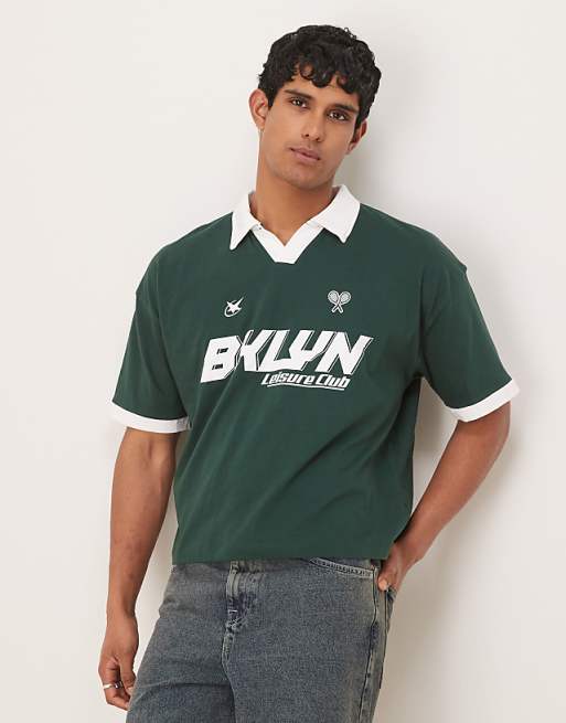 DESIGN boxy oversized polo with sport graphic in dark green