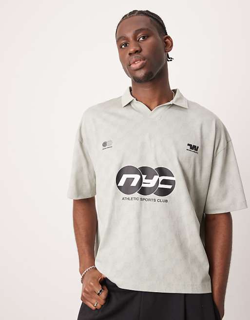 DESIGN boxy oversized polo with sports graphic in grey