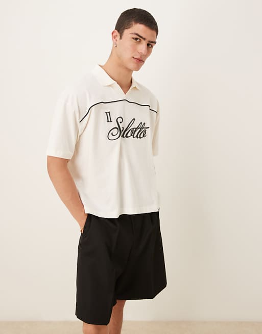 DESIGN boxy oversized polo with text graphic in cream