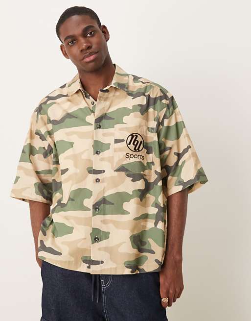 DESIGN boxy oversized shirt with chest embroidery in camo print
