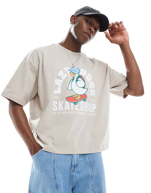 DESIGN boxy oversized t-shirt in with cartoon graphic in stone