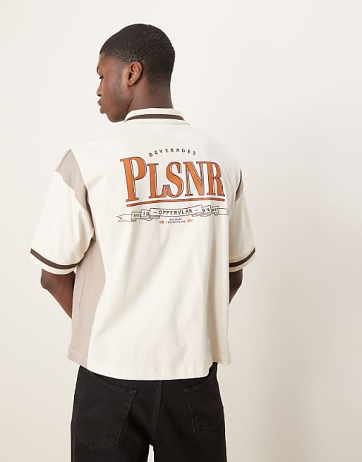 DESIGN boxy oversized zipped polo with cut and sew panelling and text graphic in cream