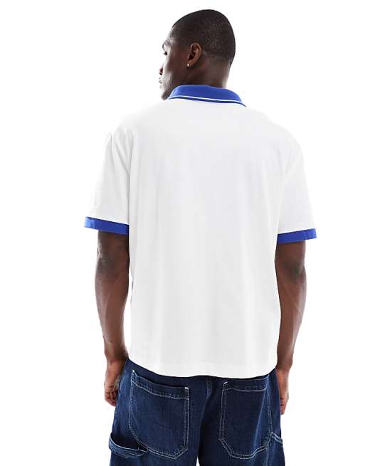DESIGN Boxy Relaxed Polo With City Graphic And Panelling In White And Blue