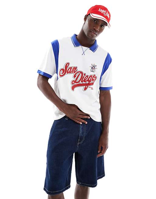 DESIGN boxy relaxed polo with city graphic and panelling in white and blue