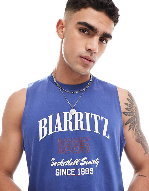 DESIGN boxy relaxed vest in blue with chest print