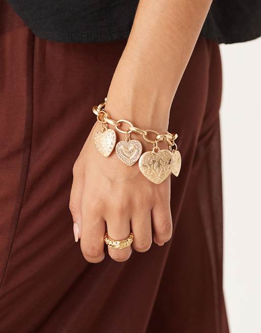 DESIGN chain bracelet with heart charms in worn gold tone