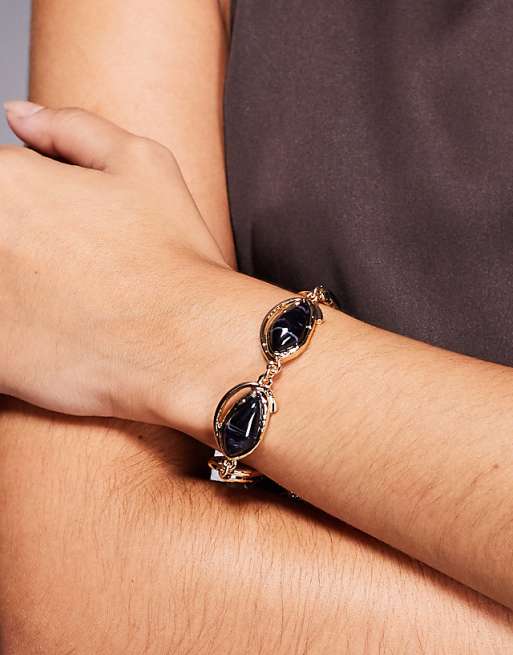 DESIGN chain bracelet with navy faux semi-precious stone setting in gold tone