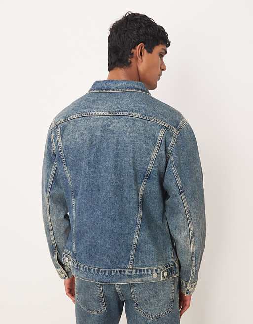 DESIGN Co-ord Denim Trucker Jacket In Mid Wash Blue With Yellow Tint