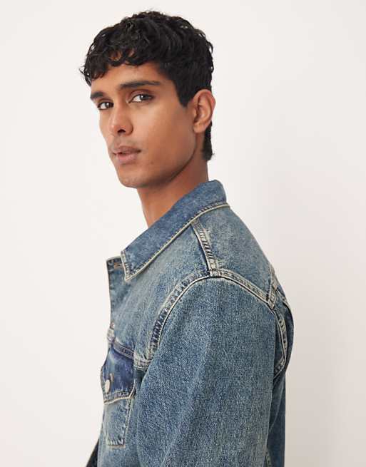 DESIGN Co-ord Denim Trucker Jacket In Mid Wash Blue With Yellow Tint