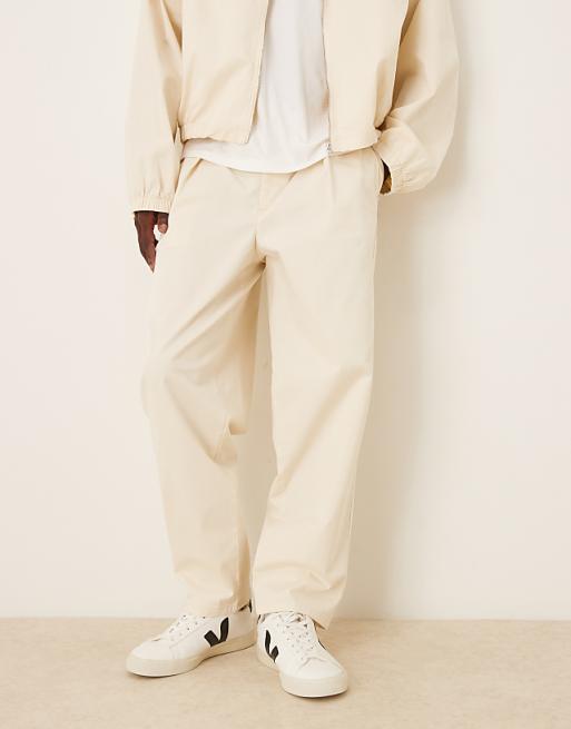 DESIGN co-ord oversized tapered trousers with deep pleat detail in ecru