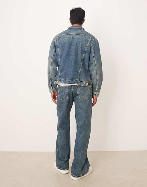 DESIGN Co-ord Wide Flare Jeans In Mid Wash Blue With Yellow Tint