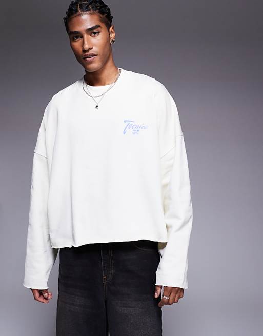 DESIGN cropped sweatshirt with raw hem with chest print in white