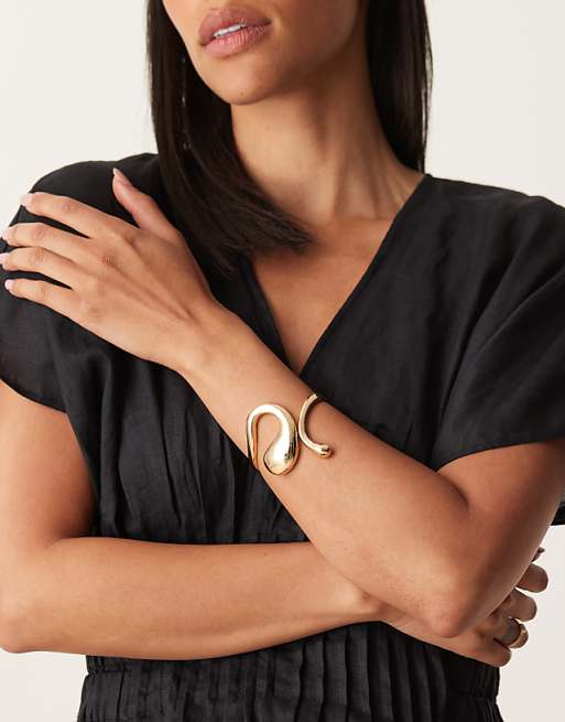 DESIGN cuff bracelet in molten design in gold tone