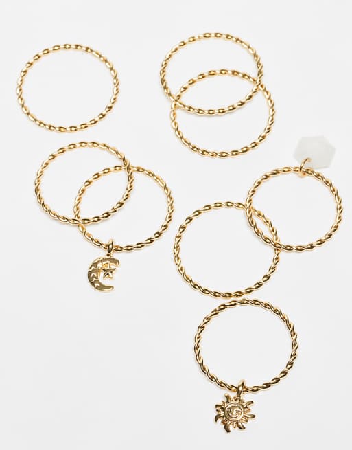 DESIGN Curve multi-pack of rings with pendant charms detail in gold tone