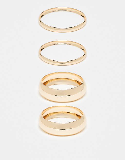 DESIGN Curve pack of 4 shiny gold bangles