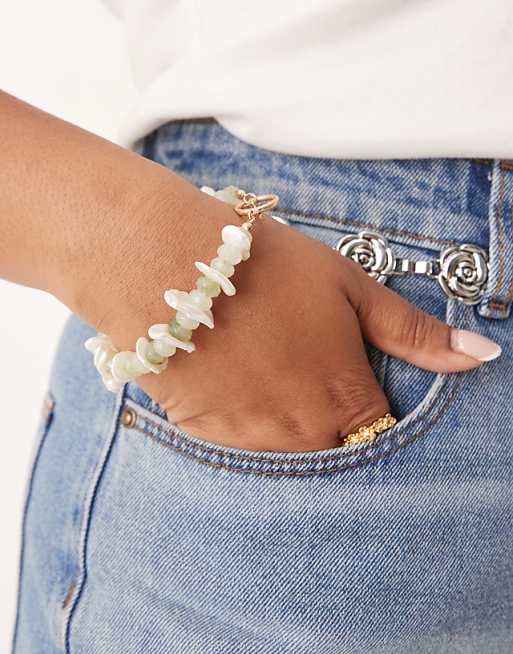 DESIGN Curve t-bar bracelet with faux chipping details in gold tone