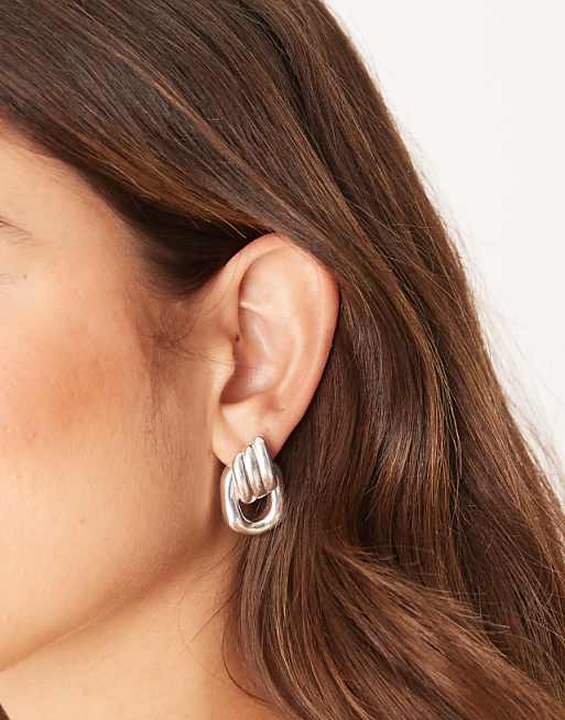 DESIGN door knocker studs earrings in silver tone
