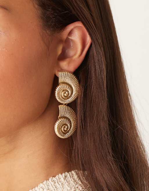 DESIGN drop stud earrings with double shell design in gold tone