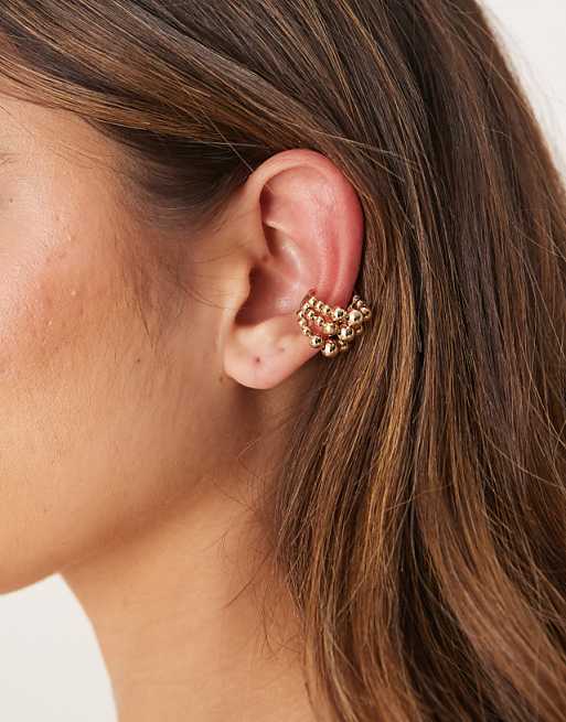 DESIGN ear cuff with triple molten row in gold tone
