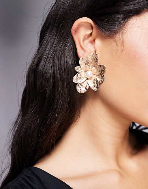 DESIGN earrings with textured petal design in gold tone