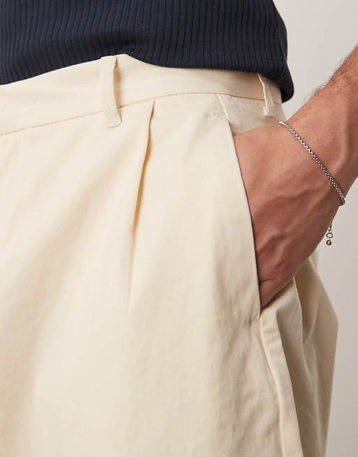DESIGN Extreme Tapered Trousers With Pleats In Beige