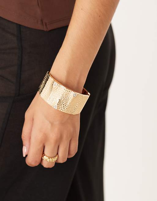 DESIGN gold hammered statement bangle