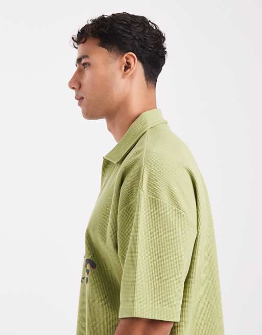 DESIGN Heavyweight Boxy Oversized Polo With Text Graphic In Green Texture